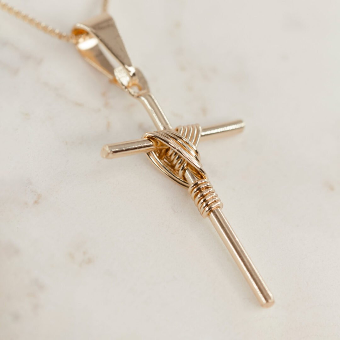 DIJE CRUZ ENTRELAZADA