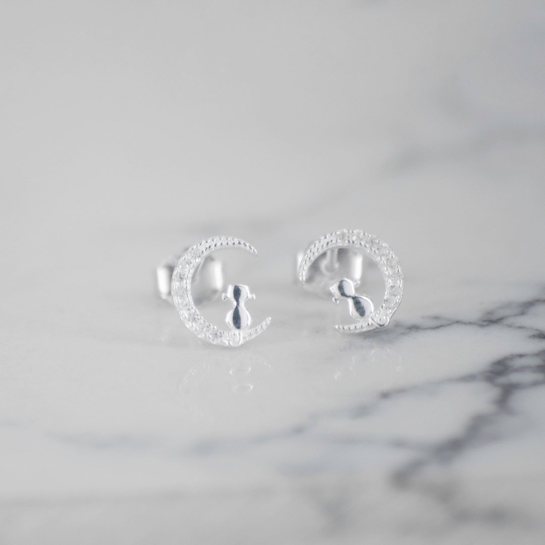 TOPO MEDIA LUNA GATO SENTADO